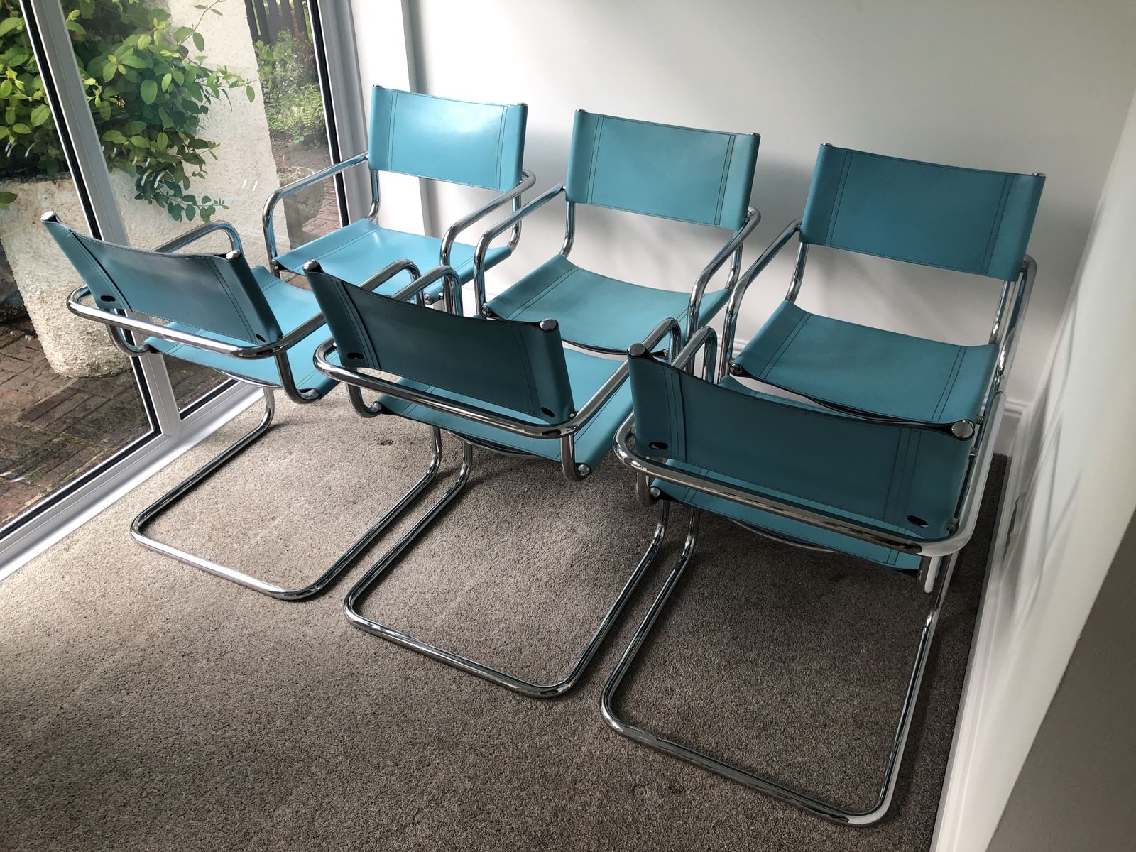 photo furniture Six Cantilevered Office/Dining Chairs In Turquoise Blue Leather And Chrome