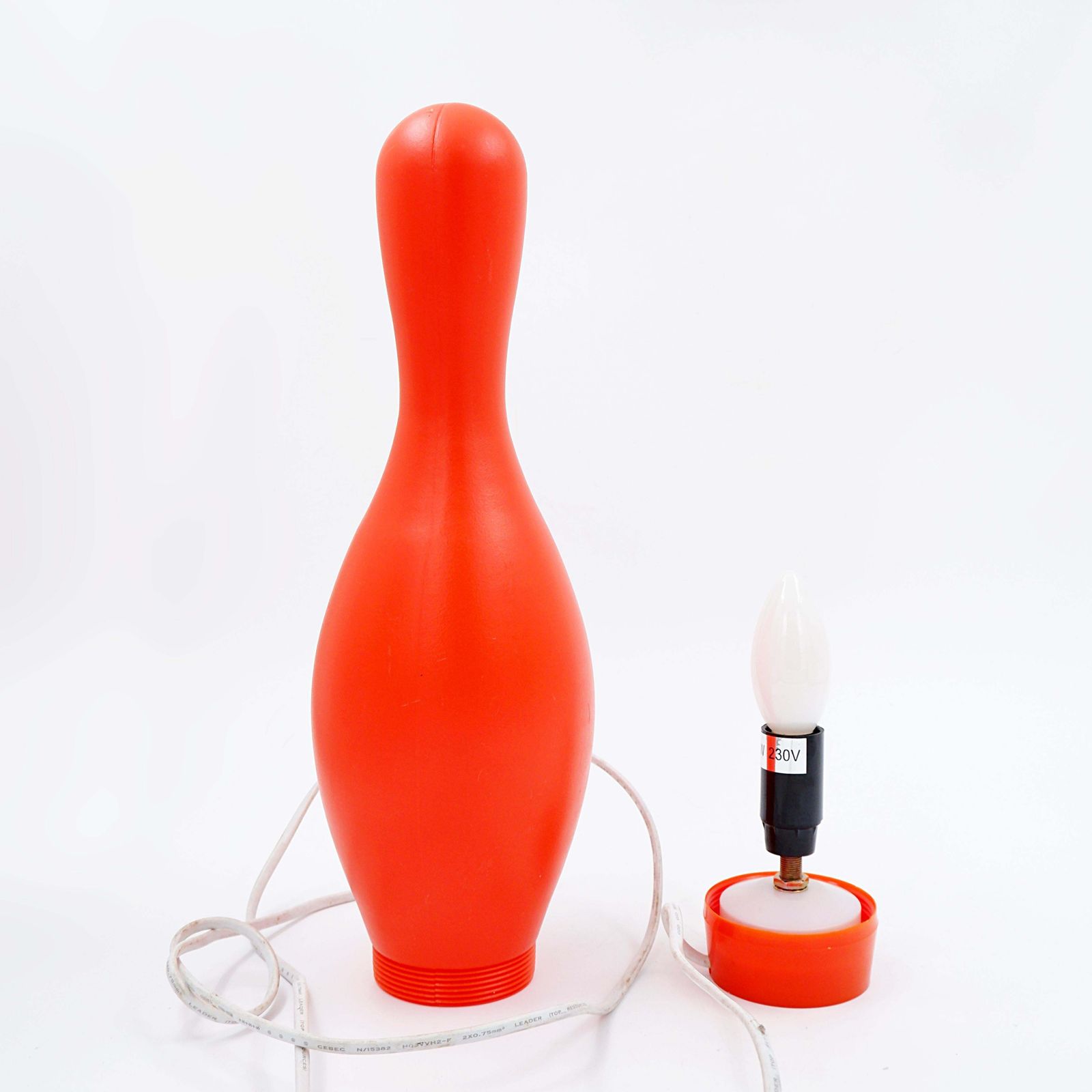 photo for sale "Knock Off Bowling Pin" Table Lamp Designed By Josh Owen For Bozart In 2002.