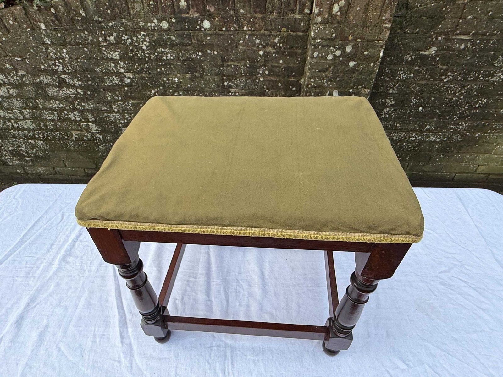 145.0 Vintage Upholstered Mahogany Footstool Or Occasional, Vanity Stool With Turned Legs And Green Velvet Like Seat photo