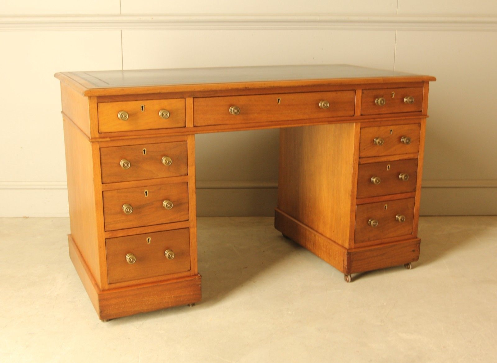 An Elegant Edwardian Walnut Twin‑Pedestal Writing Desk