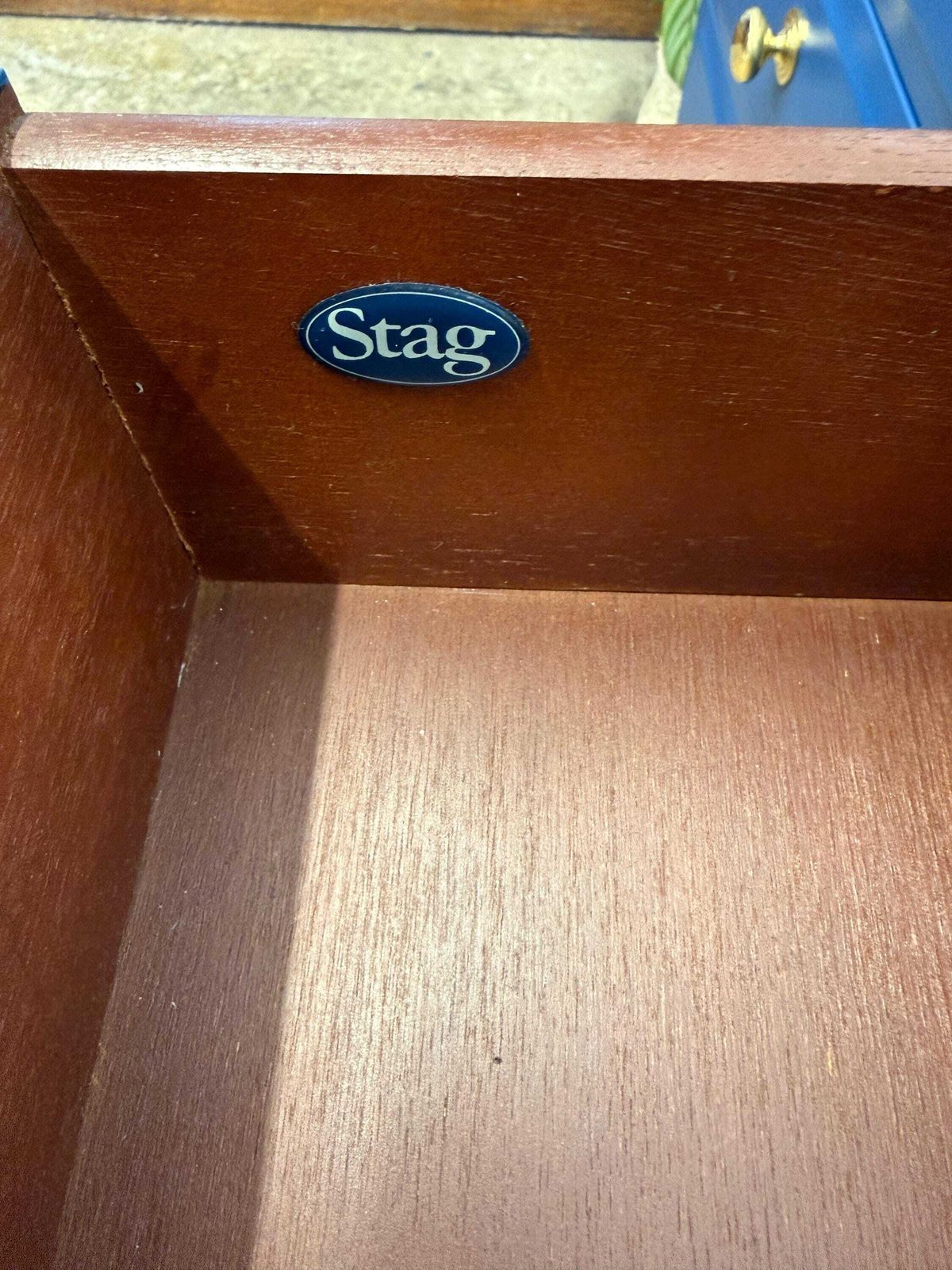 645.0 Stag Minstrel Bedside Chest Of Drawers – Painted In Symphony Blue – Polished Brass Knobs photo