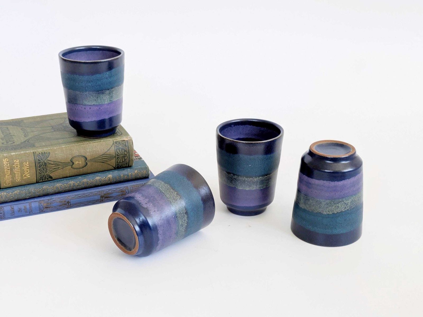 photo buy Midcentury Kmk Viola Pottery Plates, Tumblers And Butterdish, Olga Nawothnig Design, 70s Germany