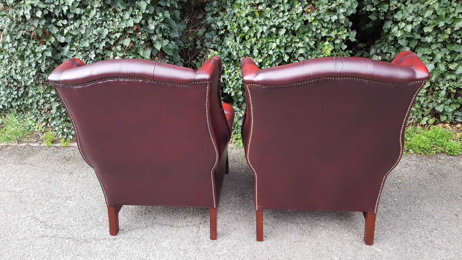 photo for sale Matching Pair Of Mahogany Red Leather Chesterfield Wingback Armchairs