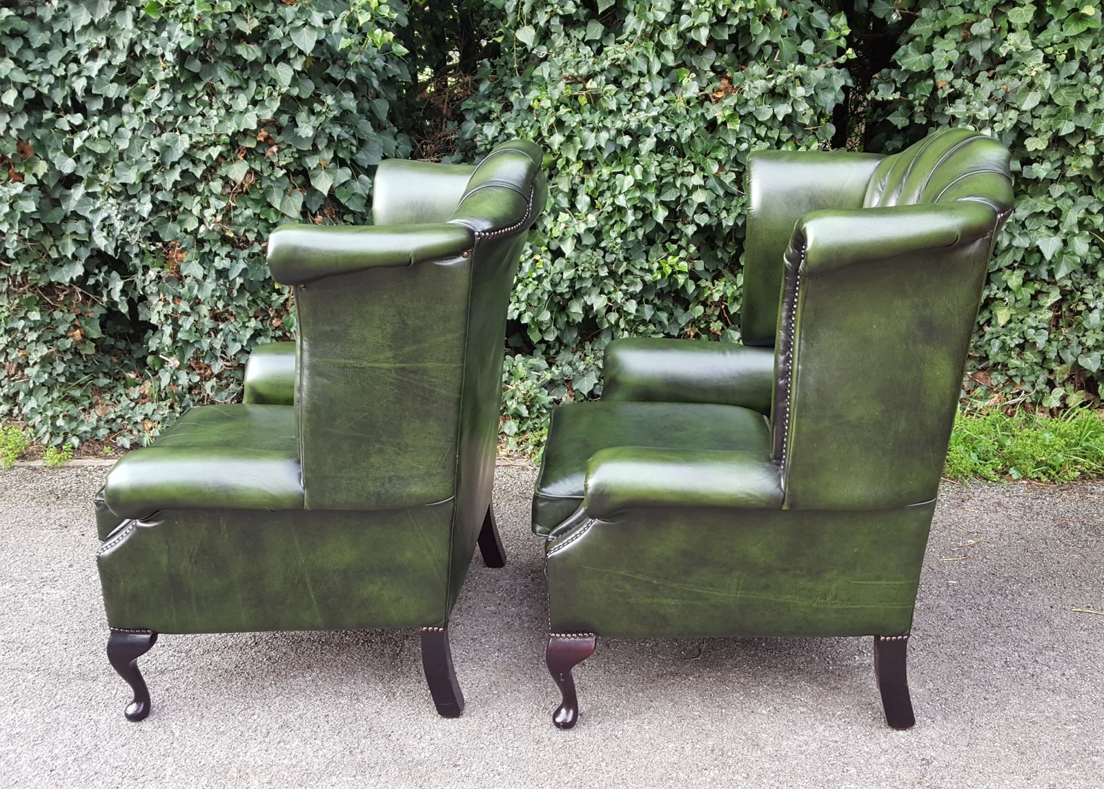 photo furniture Matching Pair Of Mahogany Green Leather Chesterfield Wingback Armchairs
