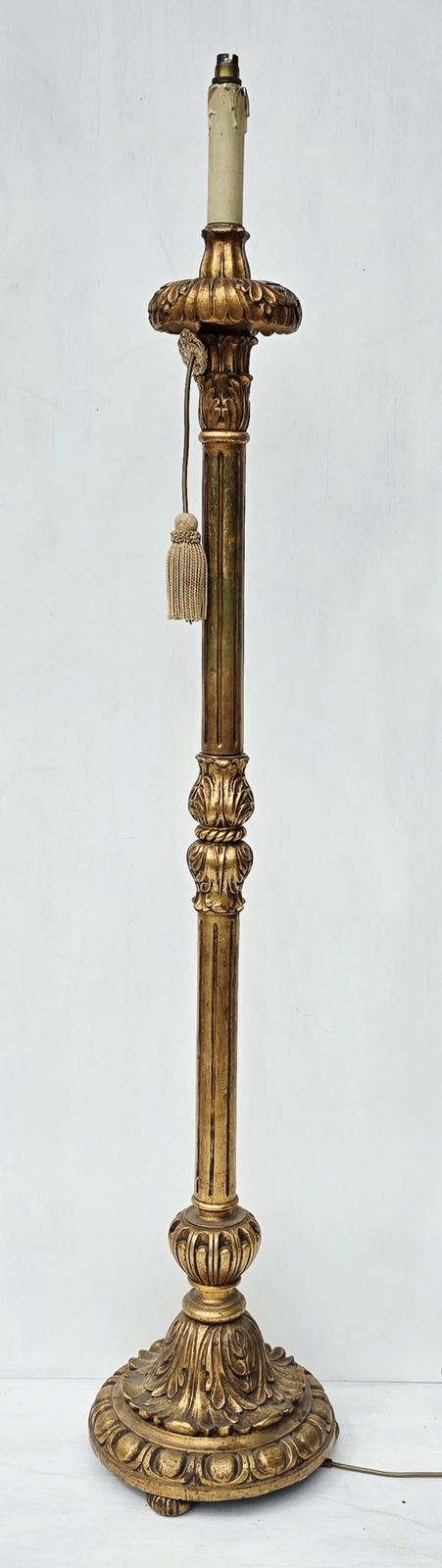 A 1920s Art Nouveau Carved Giltwood Standard Lamp.