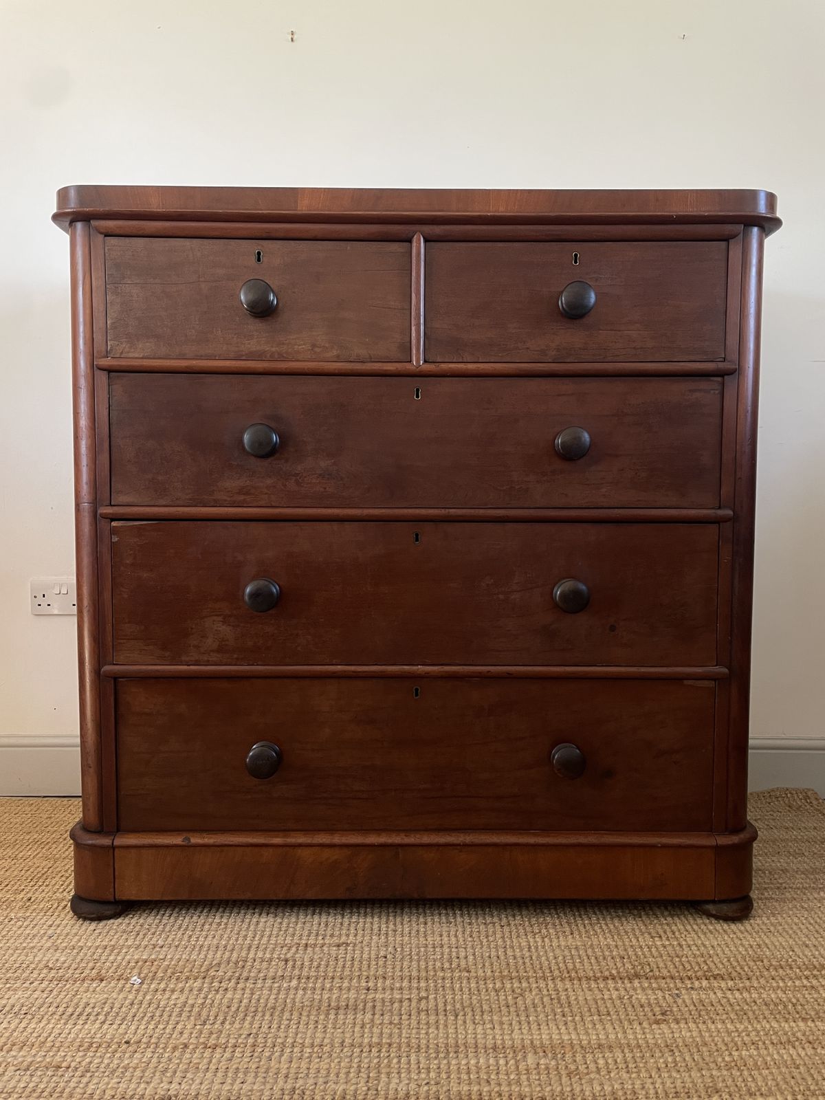 An Antique Mahogany Chest Of Drawers