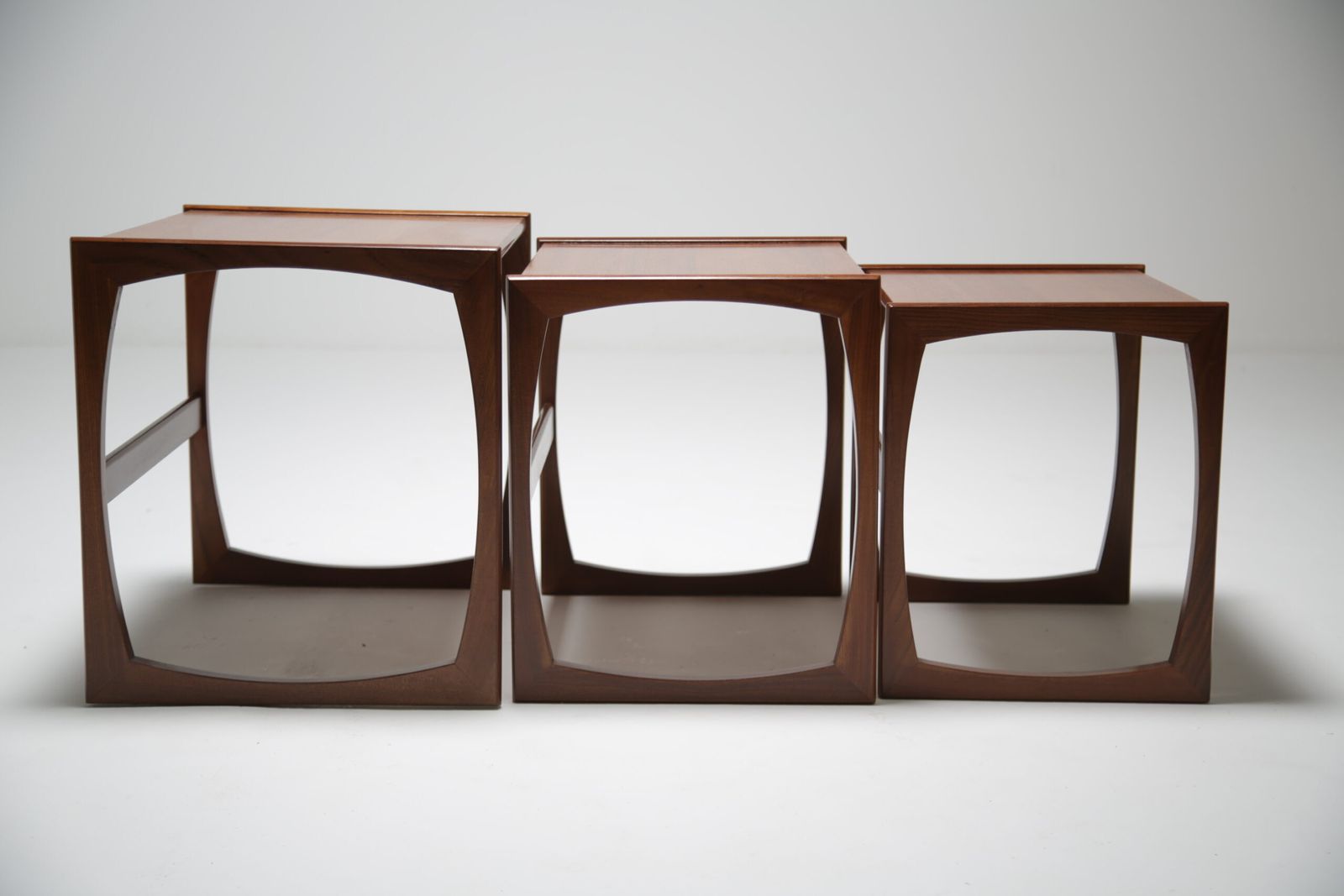 G Plan Quadrille Nest Of Tables: Iconic Teak & Afromosia ‘Sled Leg’ Trio By R. Bennett, Uk, 1960s photo for sale