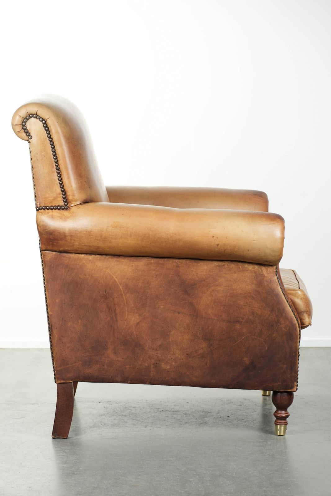 Beautiful And Comfortable Armchair Made Of Cowhide Leather With A Characterful And Charming English Look. photo for sale