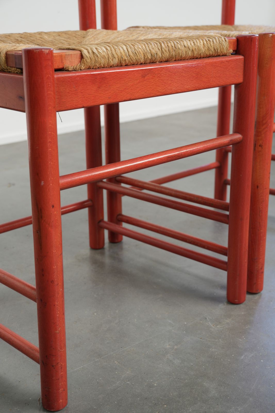 photo furniture Set Of Two Nice Red Vintage Wooden Chairs From The 70s With A Woven Cane Seat
