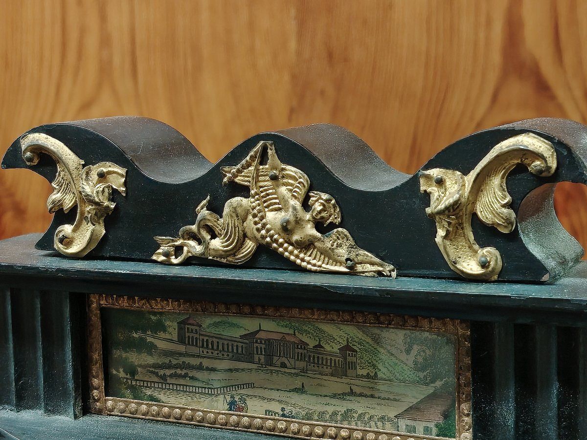 Biedermeier Mantel Clock In Ebonized And Gilded Wood, With Alabaster Columns, 19th Century photo for sale