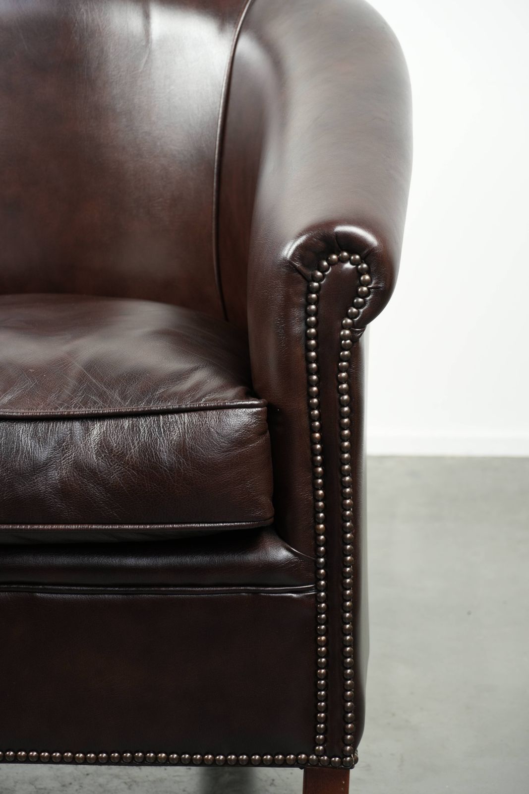 photo for sale Dark Cowhide Club Armchair In Good Condition With A Timeless And Stylish English Style Design.