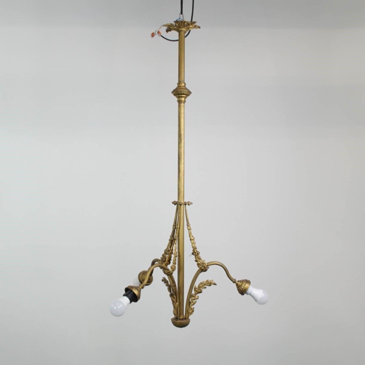 Antique Pendant Lamp With Gold Colored And Ornate Details And 3 Sockets