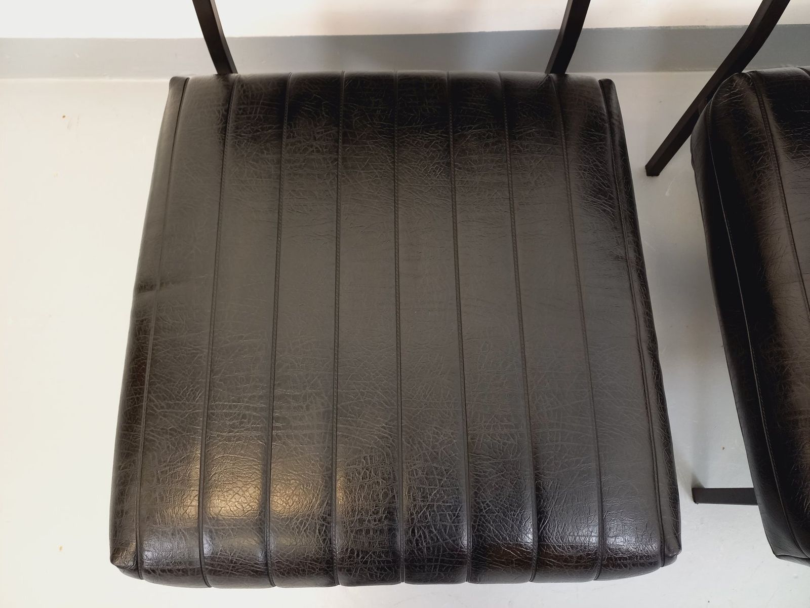 2 Modernist Armchairs In Black Imitation Leather And Metal photo vinterior