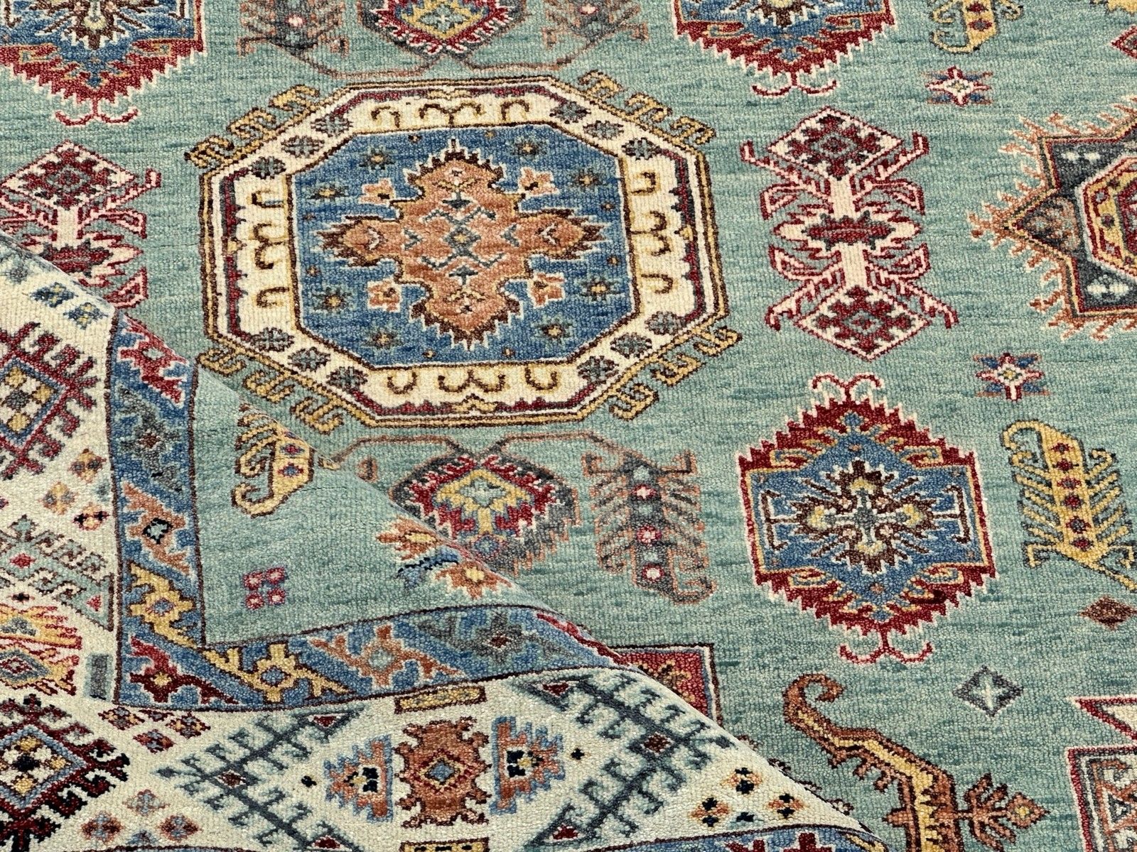 Handgeknoopt wollen vloerkleed 245 x 305 cm, turquoise geometrisch patroon photo vinterior