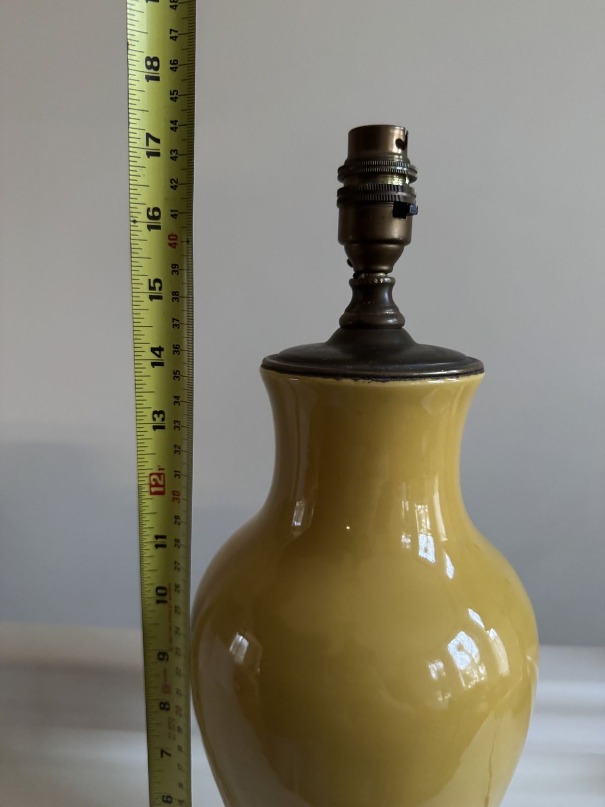 A Pair Of Pale Yellow Porcelain And Brass Tablelamps photo buy