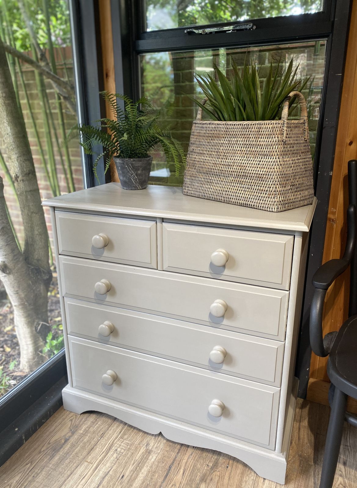 A Compact Solid Chest Of Drawers Hand Painted In A Neutral