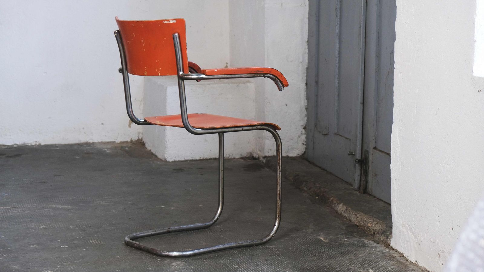 Bauhaus Cantilever Chair With Armrests In Orange From The 1930s photo vinterior