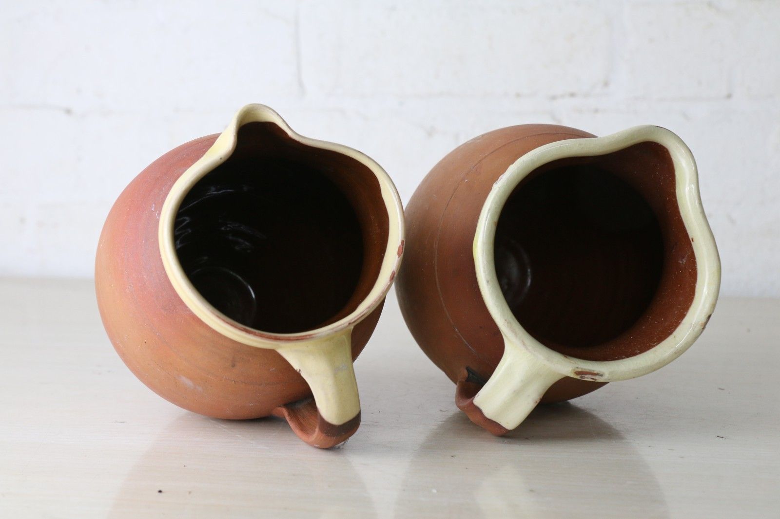 Two Antique 19th Century Jugs Terracotta Slip Glazed Internally With A Cream Rim photo vintage