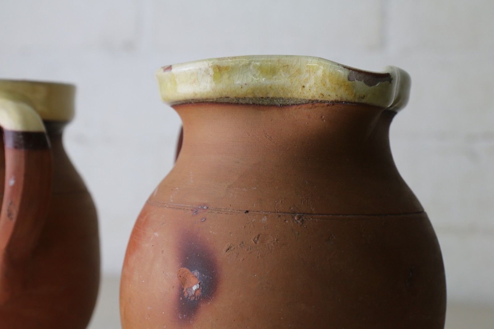 photo vinterior Two Antique 19th Century Jugs Terracotta Slip Glazed Internally With A Cream Rim