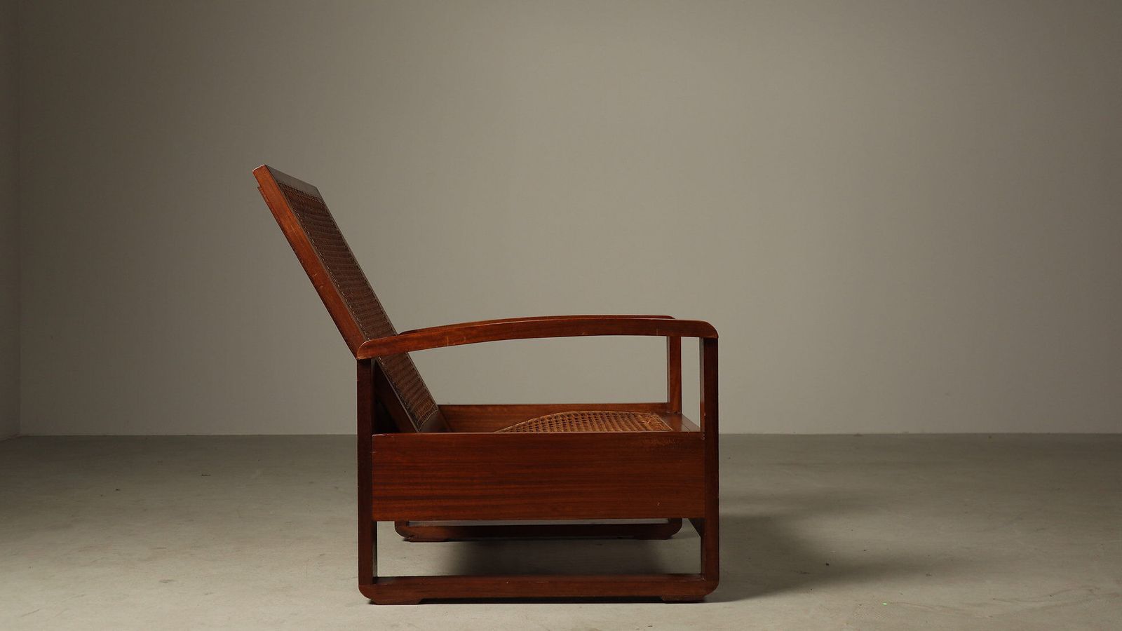photo furniture Mid Century Architectural Teak Lounge Chair With Cane Seat, 1950s