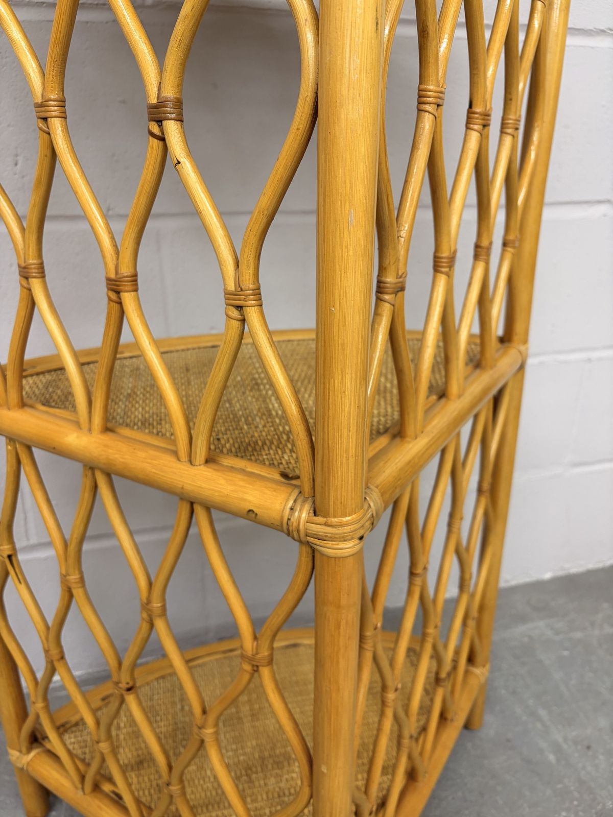 photo for sale Vintage Tall Corner Cane/ Rattan Shelving Unit