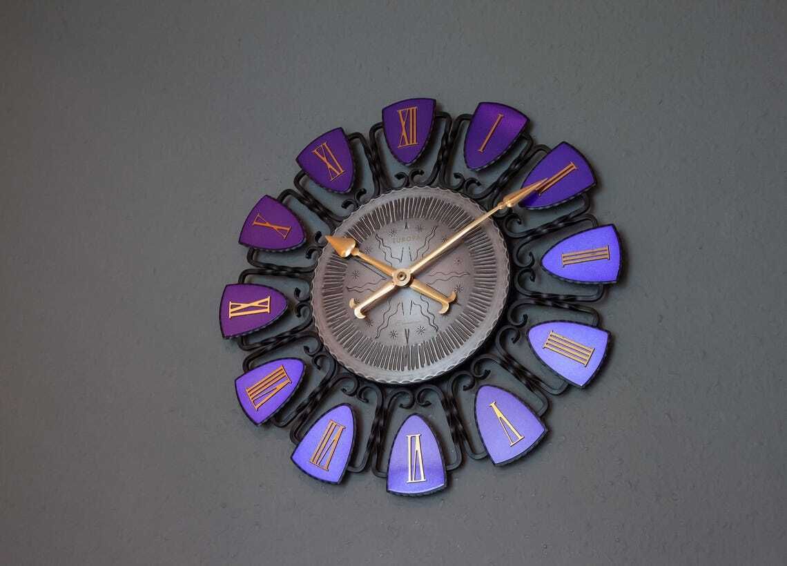 233.0 1960s Europa Wrought Iron Wall Clock Mid Century Atomic Germany Modernism Starburst Junghans Blue Gold photo