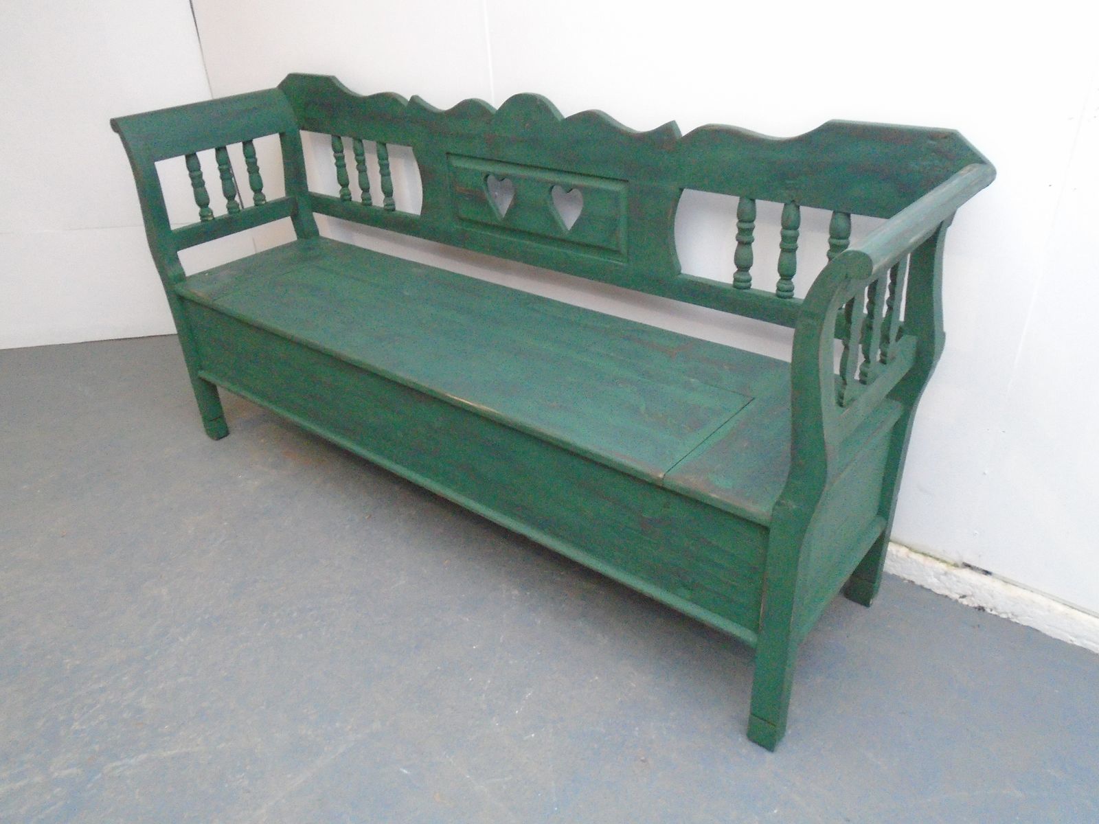 A Green & Black Heart Motif Antique Pine 3 Seater Bench