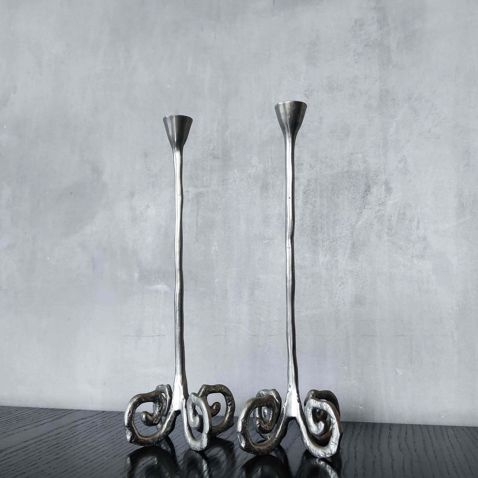photo furniture Pair Of Vintage Cast Aluminium Candle Holders With Spiral Feet