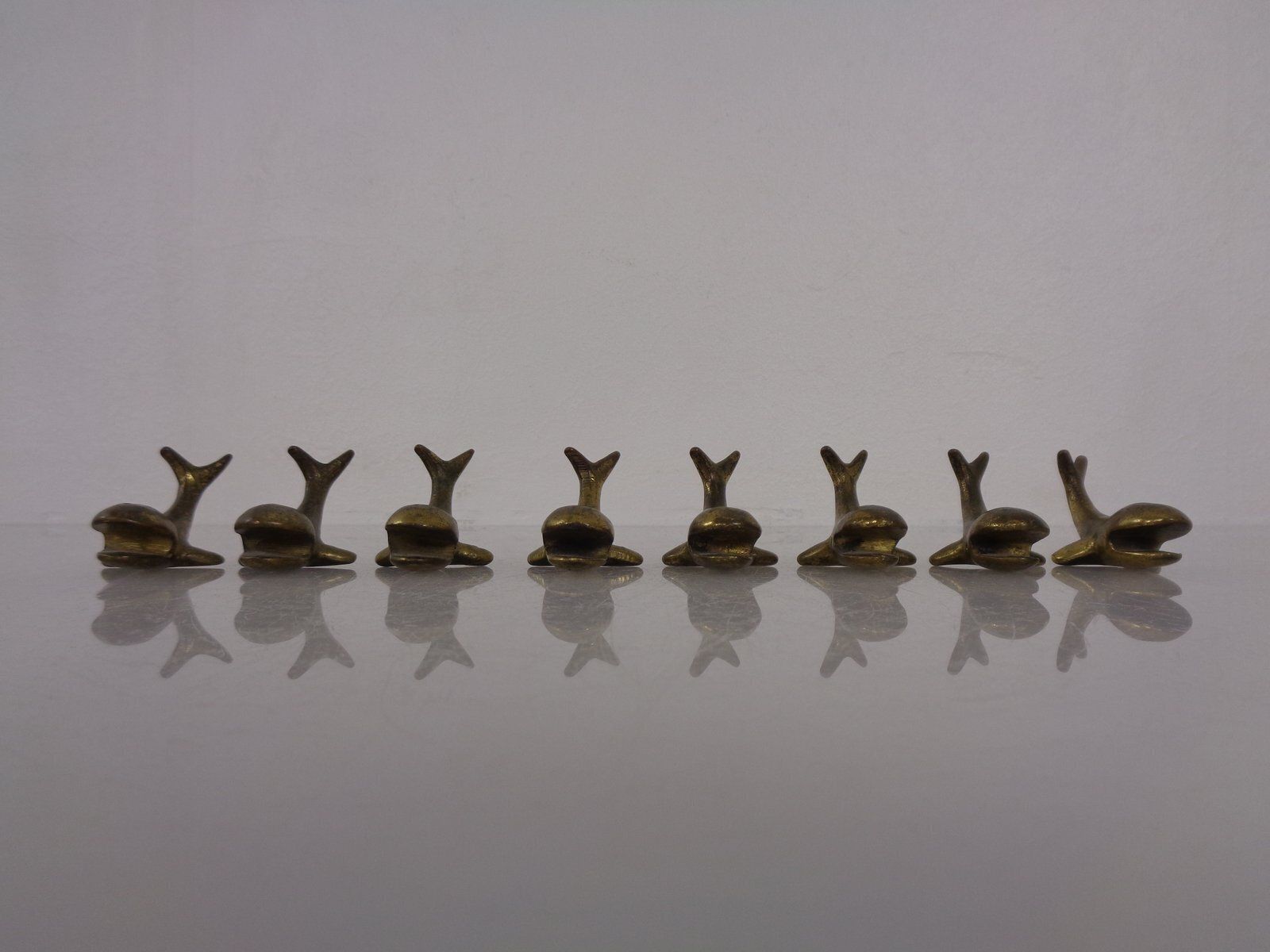 Whale Shaped Brass Paperweights Or Knife Rests In The Style Of Walter Bosse, Austria, 1950s, Set Of 4 photo vintage