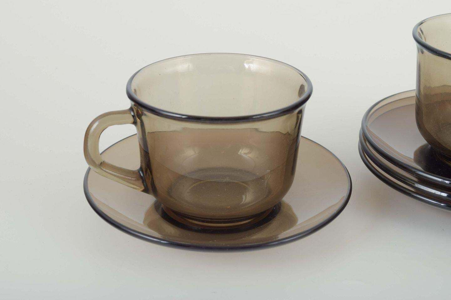 Vereco, France. Set Of Four Cups And Four Saucers In Smoked Glass. 1970s. photo for sale
