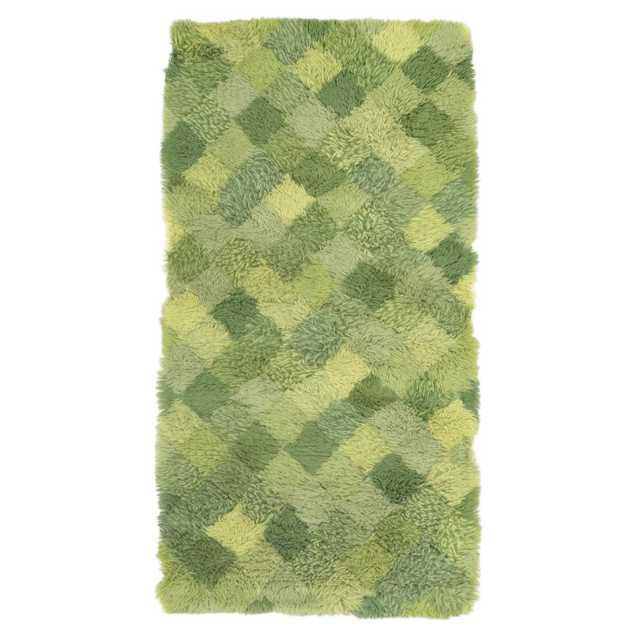 Tapis rya à motif à carreaux en camaïeu de vert, designer scandinave