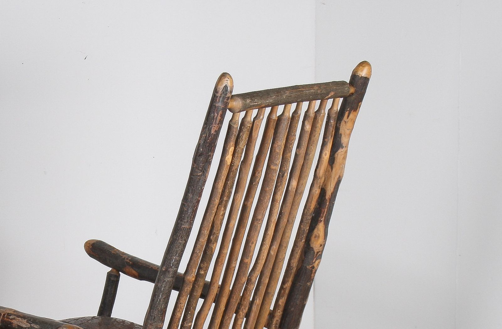 Antique American Stick Back Rocking Chair With Distressed Patina And Leather Seat photo furniture