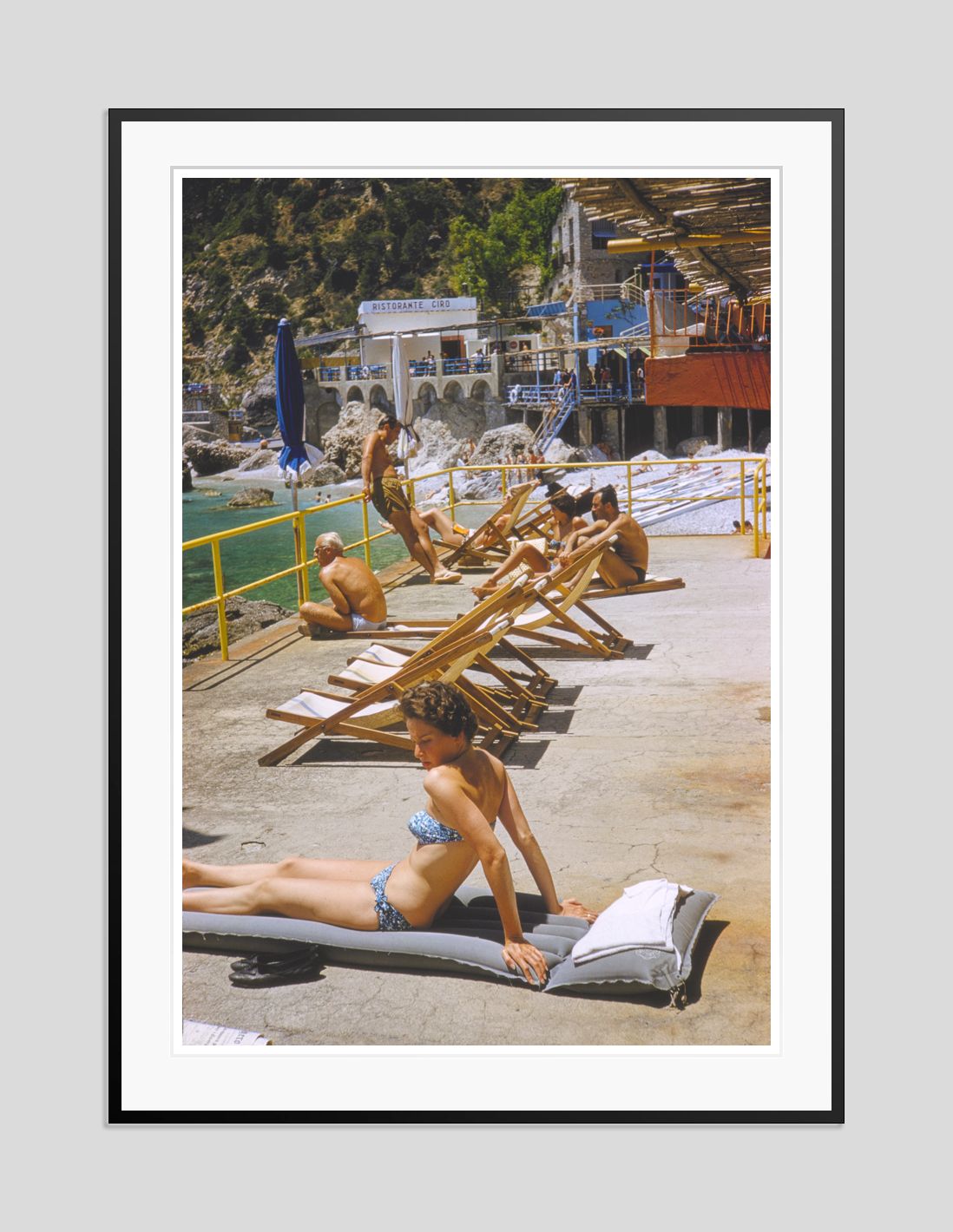 Toni Frissell 'Capri Suntan' Archival Pigment Print Framed In Black photo furniture