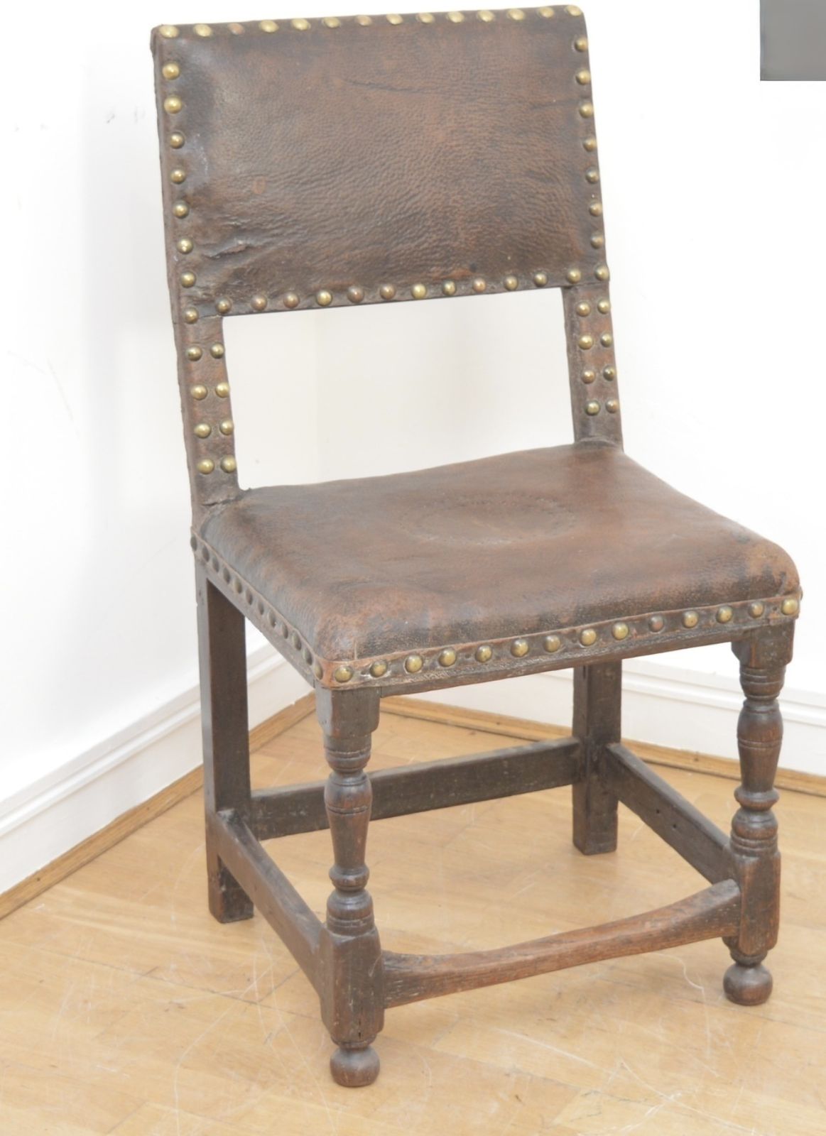 17th Century Oak Leather And Brass Studded Chair
