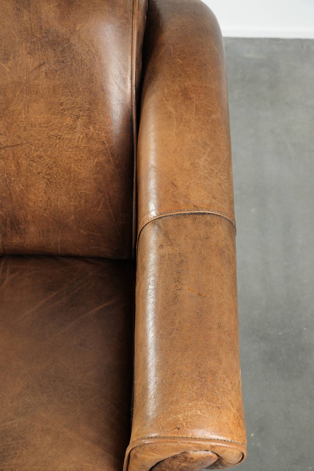 Beautifully Designed And Comfortable Sheepskin Armchair With A Timeless Look And A Finish With Matching Piping. photo vintage