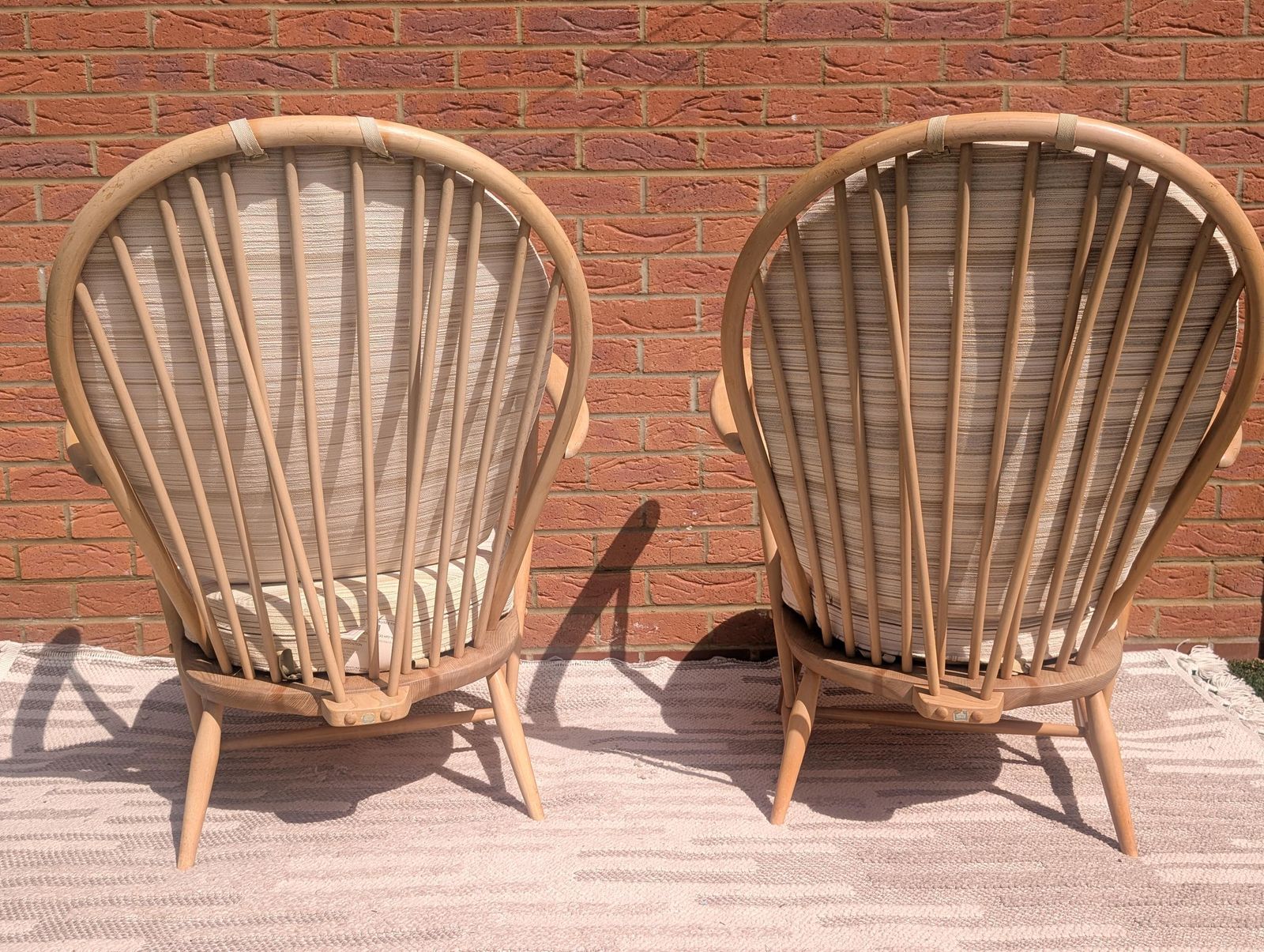 photo vinterior Pair Of Ercol 317 Grandfather Armchairs In Blonde Finish With Matching Footstool Including Original Cushions And Covers By Lucian Ercolani.