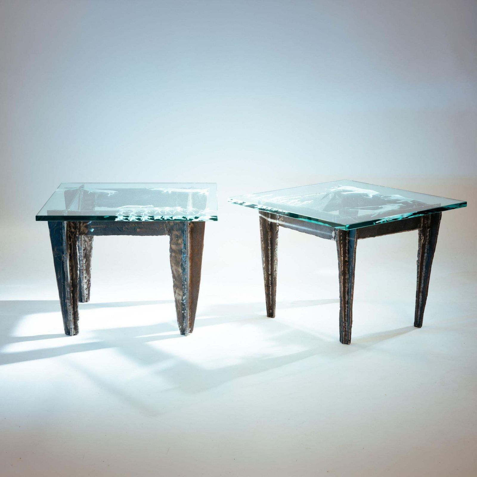 photo furniture 2 Brutalist Steel Side Tables With Primitive Safari Scene Motifs Etched Glass