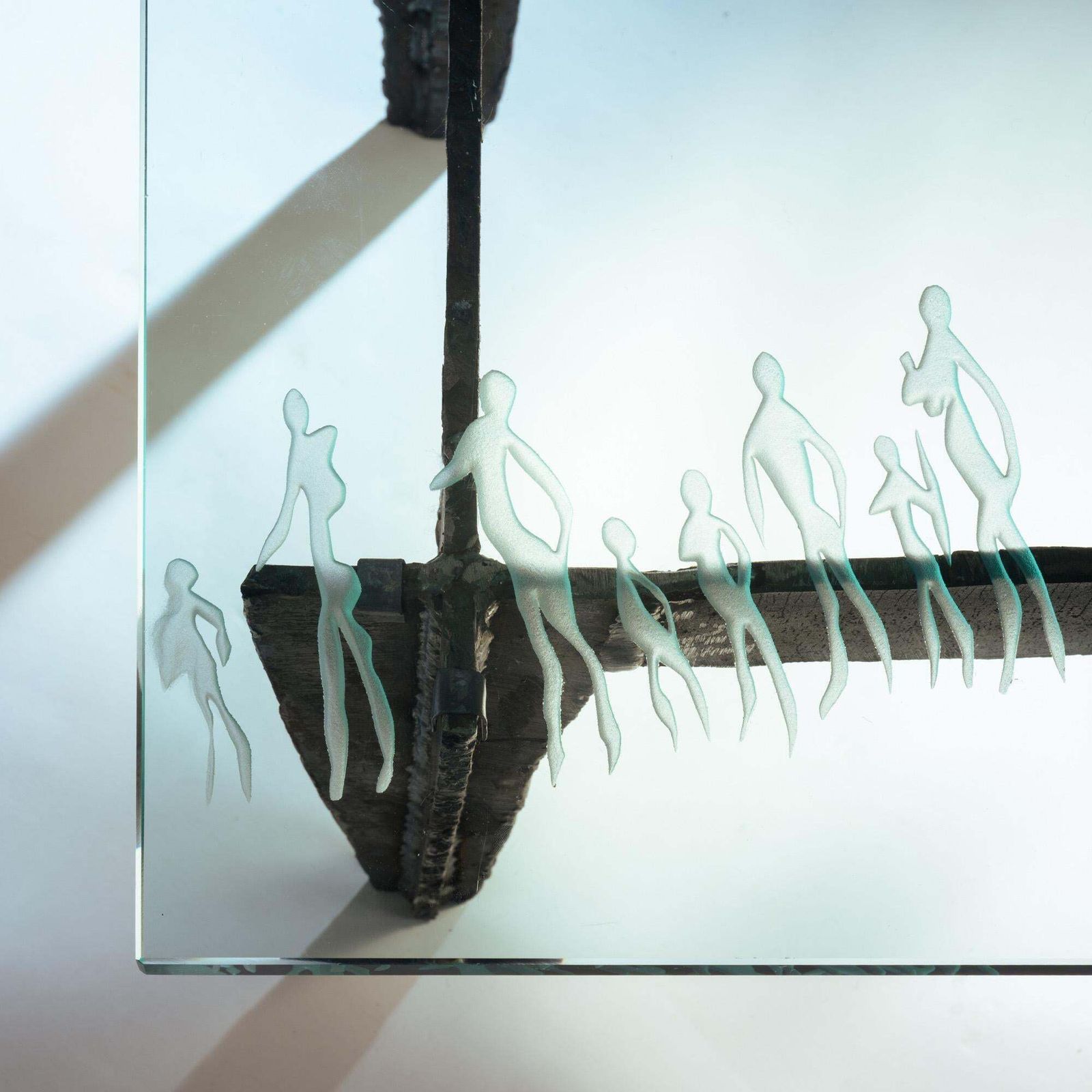 photo vinterior 2 Brutalist Steel Side Tables With Primitive Safari Scene Motifs Etched Glass