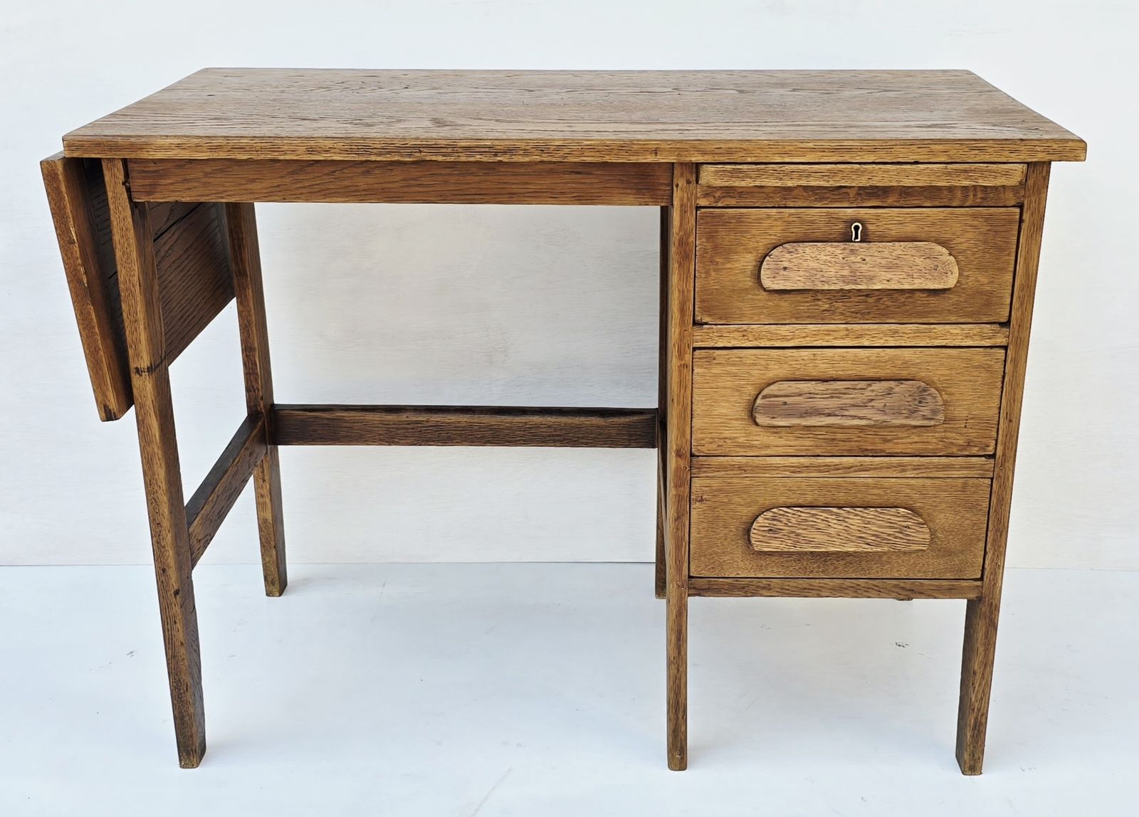 photo buy A Petite Mid Century Oak Drop Leaf Desk, Single Pedestal.