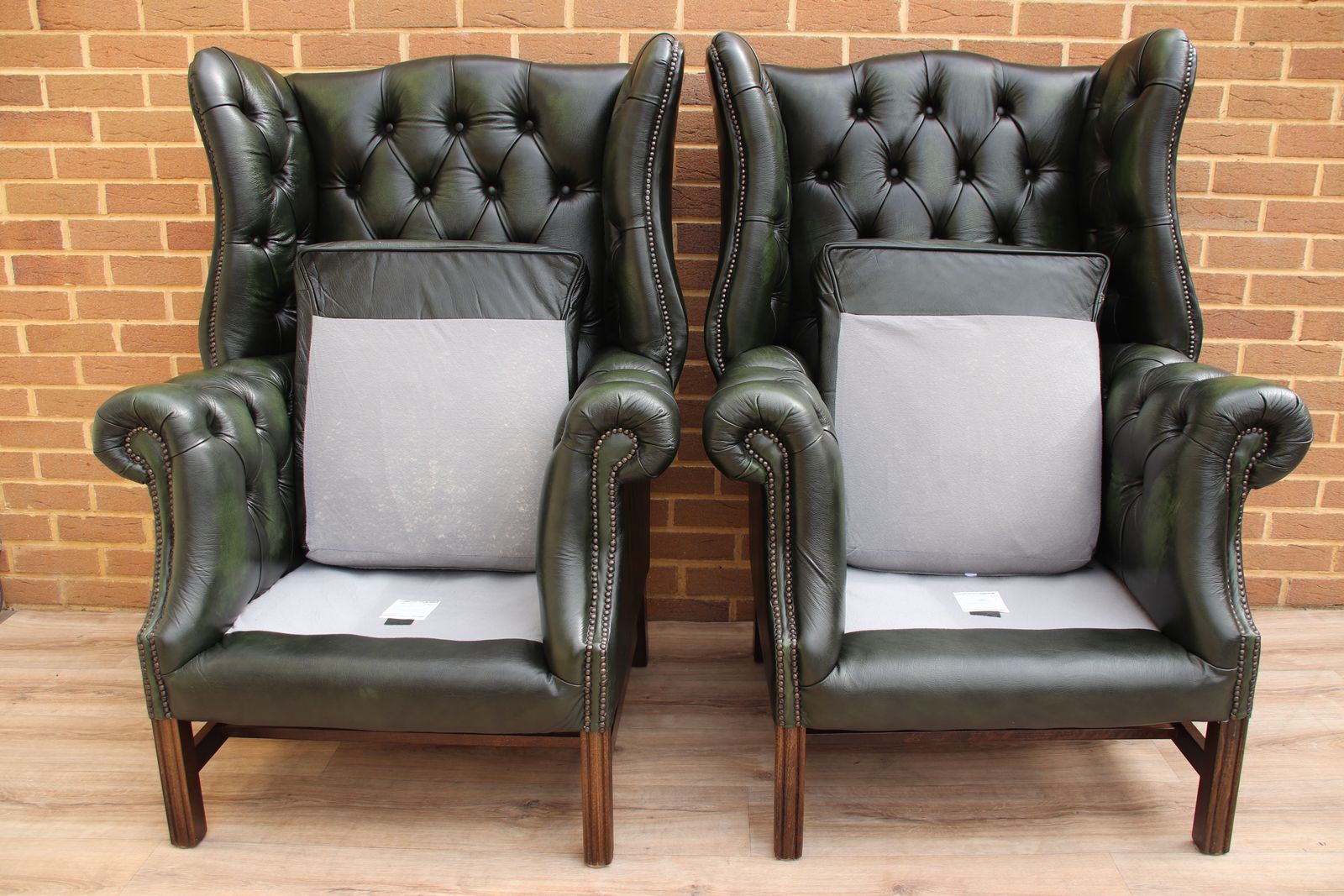 photo buy Pair Of Manchester Chesterfield High Back Directors Armchairs