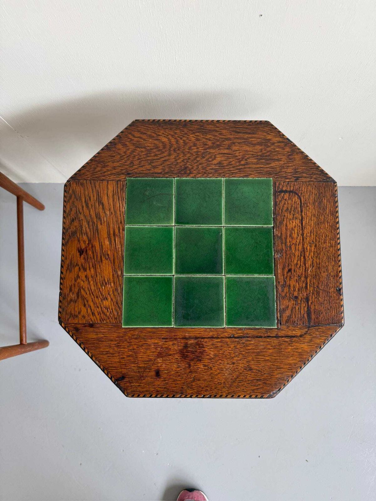 Antique Side Table With Green Tiled Top, Chevron Inlays And Tapered Legs photo for sale