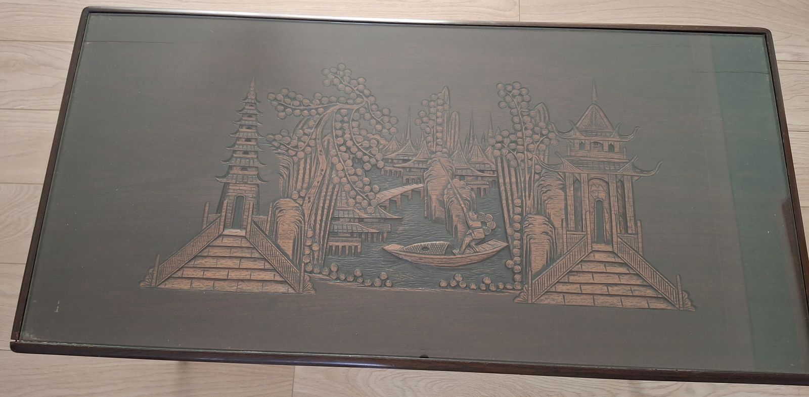Coffee Table With Carved Chinese Inlays Under A Glass Top photo for sale