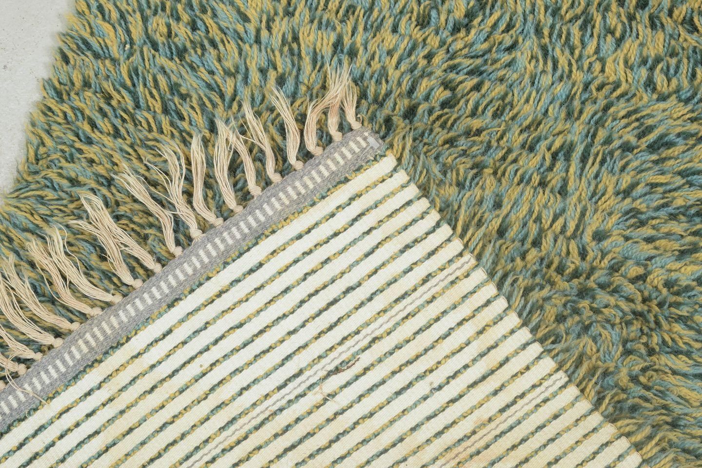 Scandinavian Designer. Rya Carpet With A Dense Pile In Shades Of Green And Beige photo Textiles
