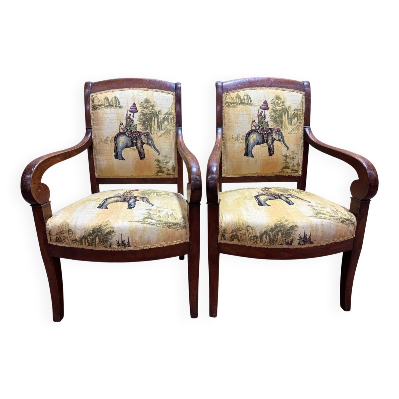 Pair Of 19th Century Armchairs With A Scrolled Back