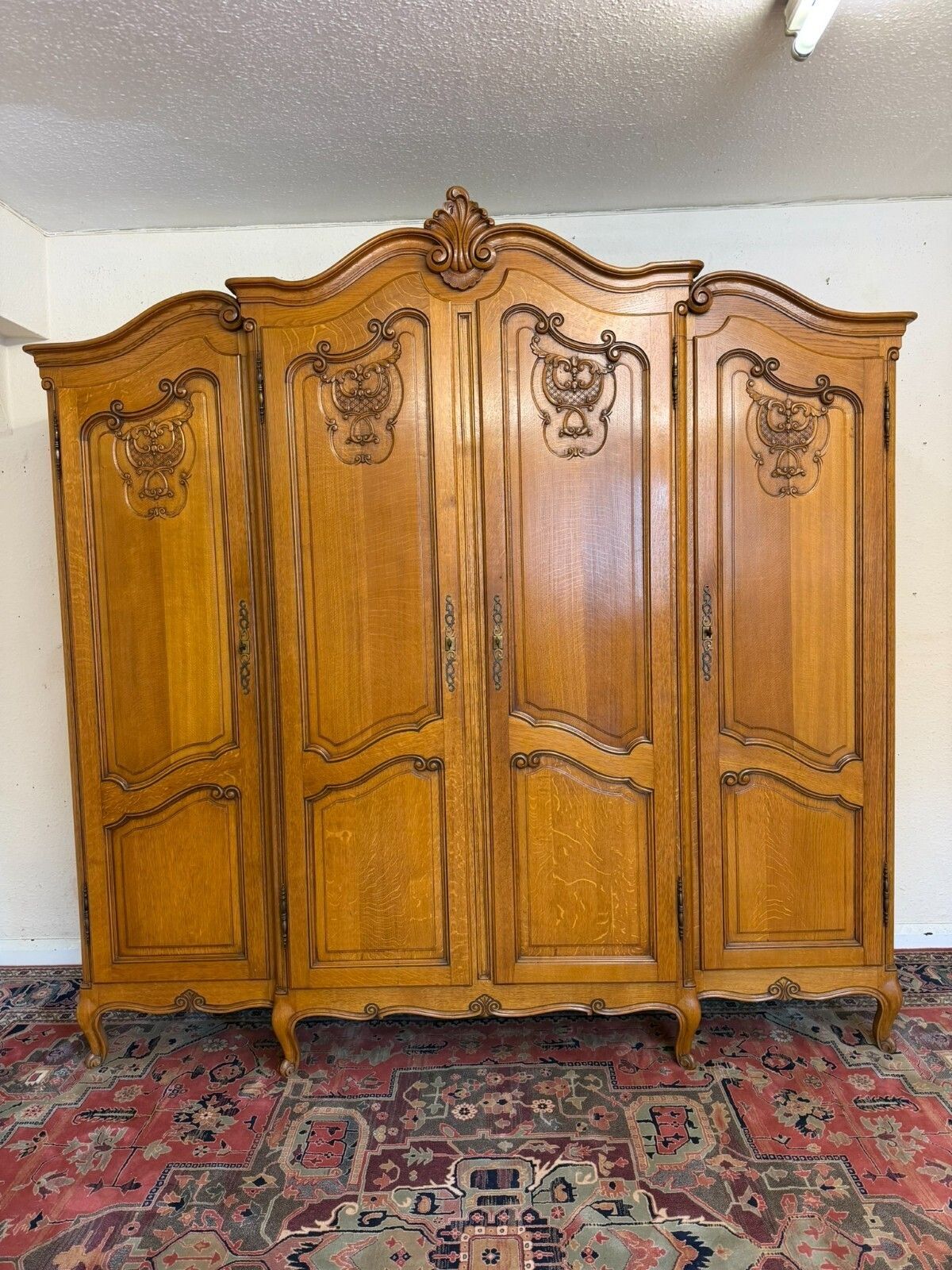 Quality French Carved Oak Four Door Brake Front Armoire/Wardrobe Circa 1950