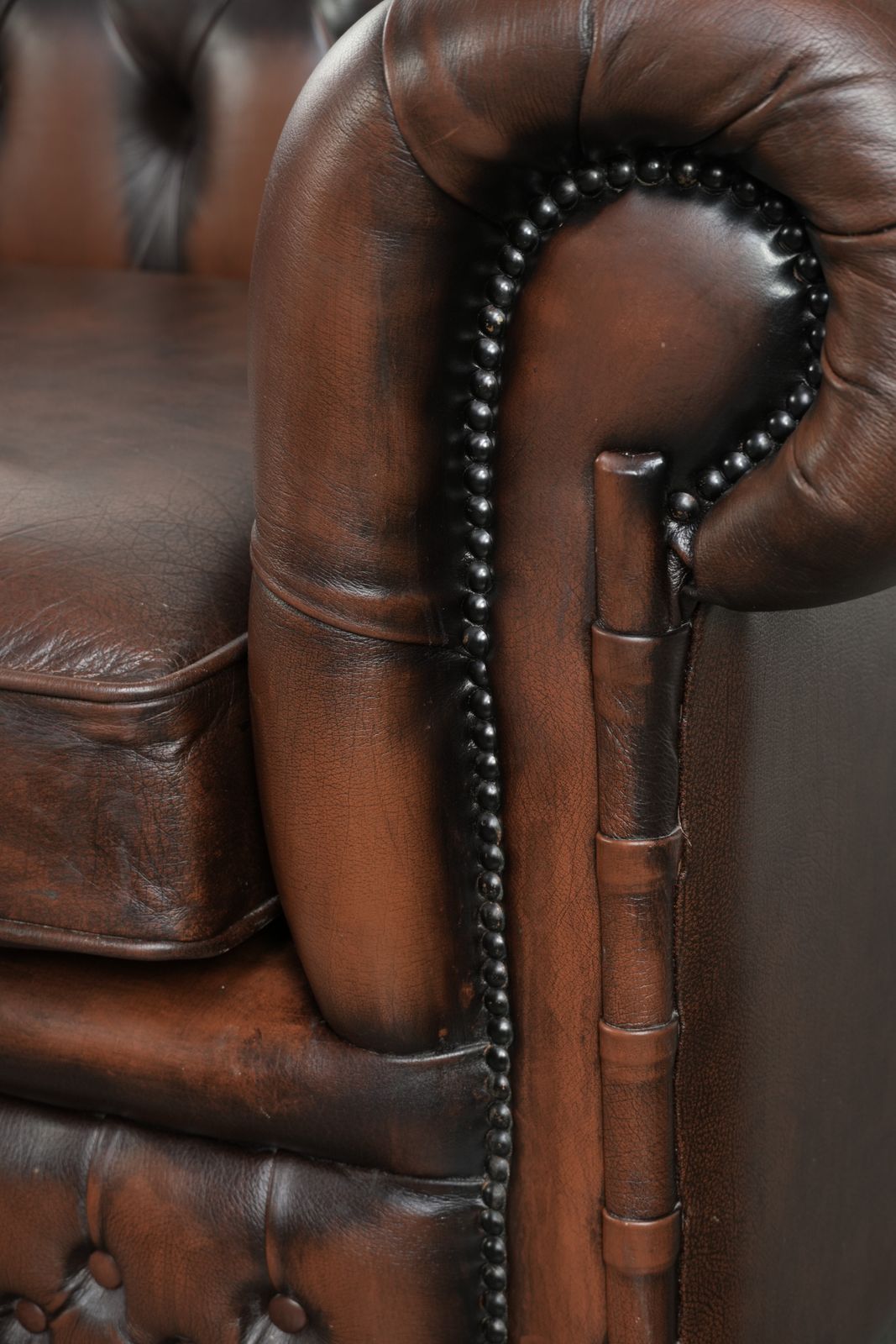 photo for sale Lovely English Style Cowhide Leather Chesterfield 2 Seater Sofa In A Beautiful Timeless Brown Color.