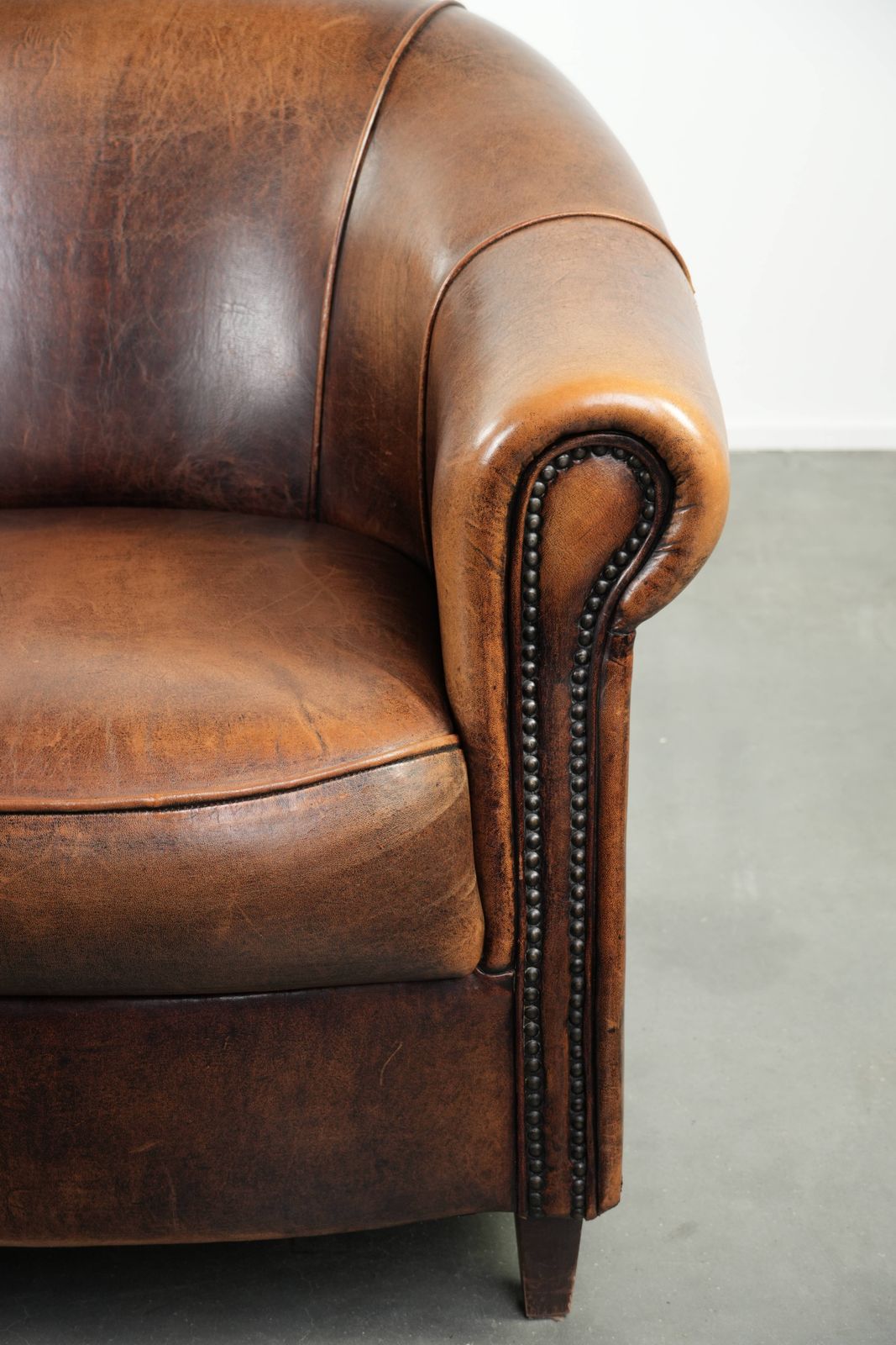 photo furniture Characterful And Comfortable Club Armchair Made Of Sheepskin With A Fixed Seat Cushion And Excellent Colors