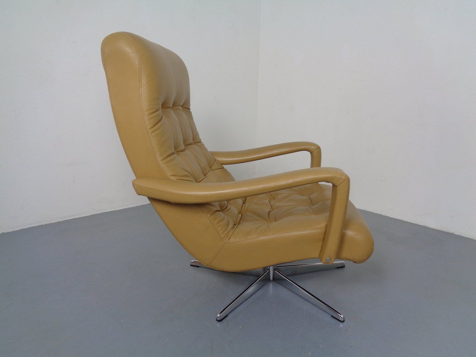 Furniture Set Of Leather Swivel Easy Chair And Ottoman, Switzerland, 1960s photo