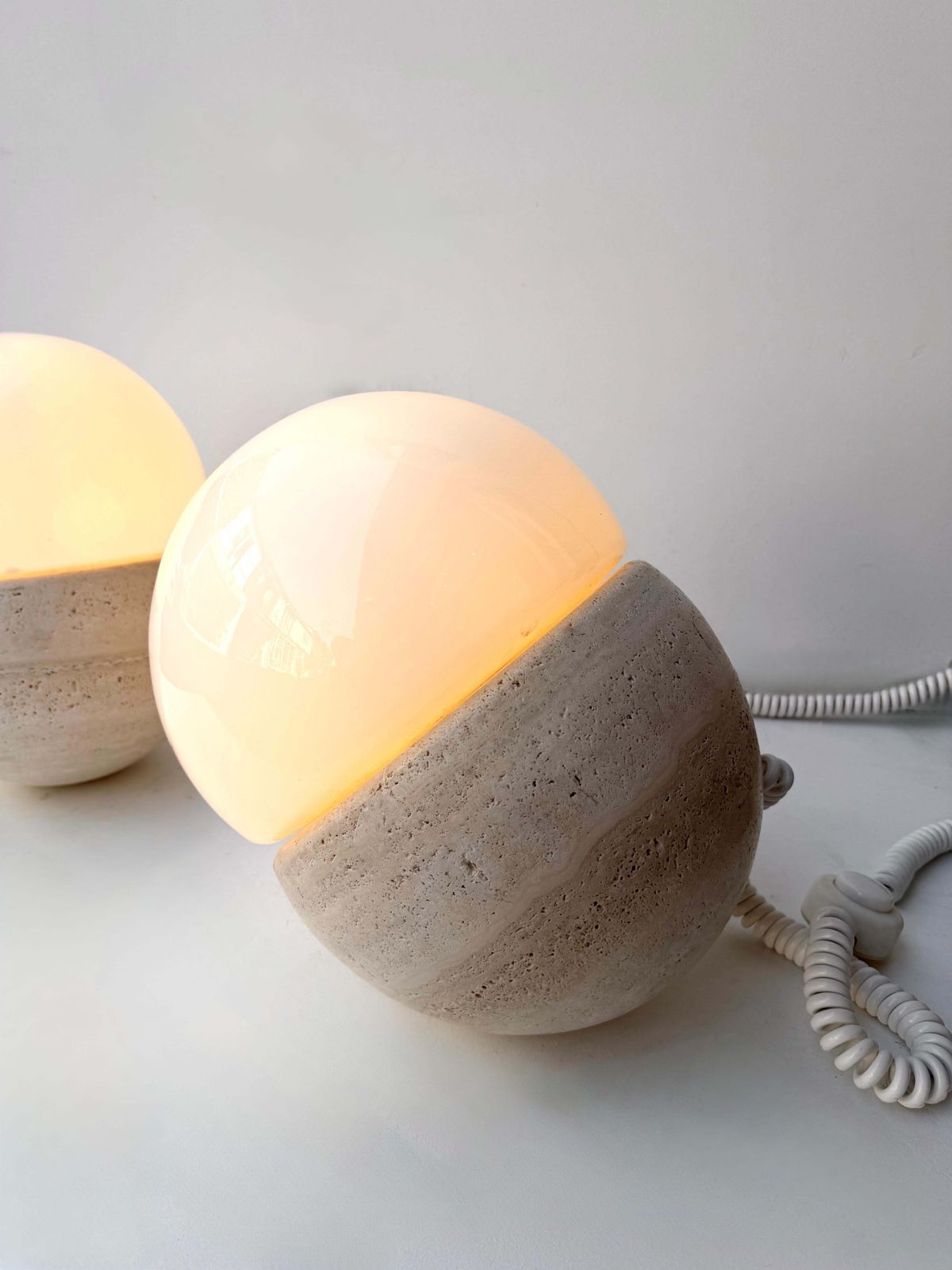 Pair Of Travertine And Opaline Glass Culbuto Lamps Italy, 1980s photo for sale
