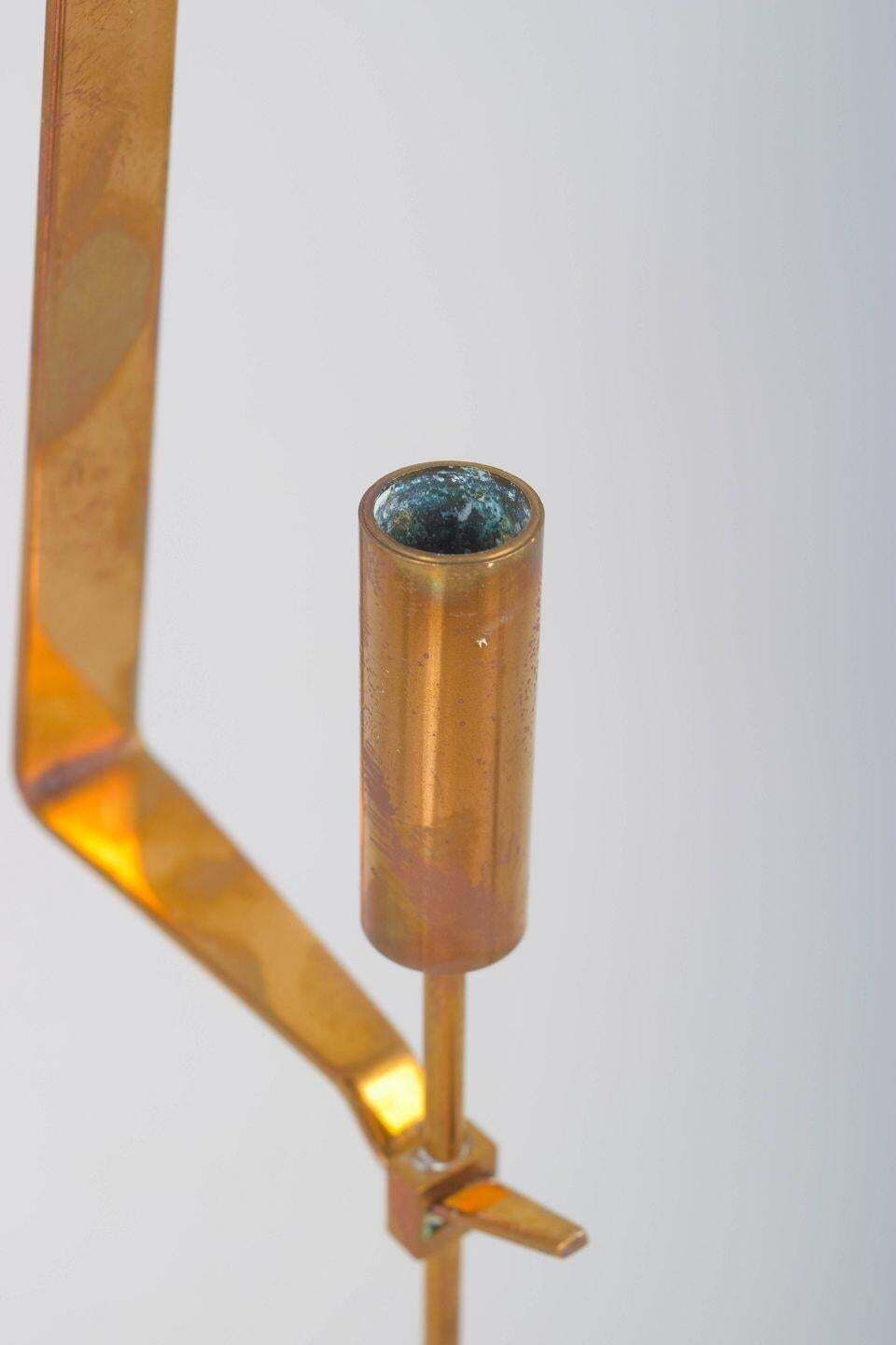 Pierre Forsell, Skultuna. Wall Candle Holder In Brass With Pendulum Suspension photo for sale
